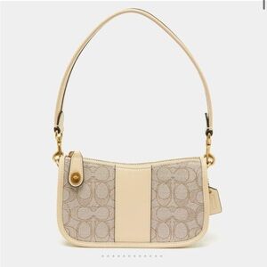 Coach beige/cream signature canvas and leather swinger Pochette bag